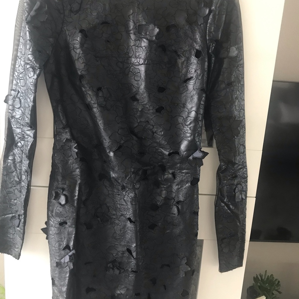 Faux leather with mesh back BCBG !